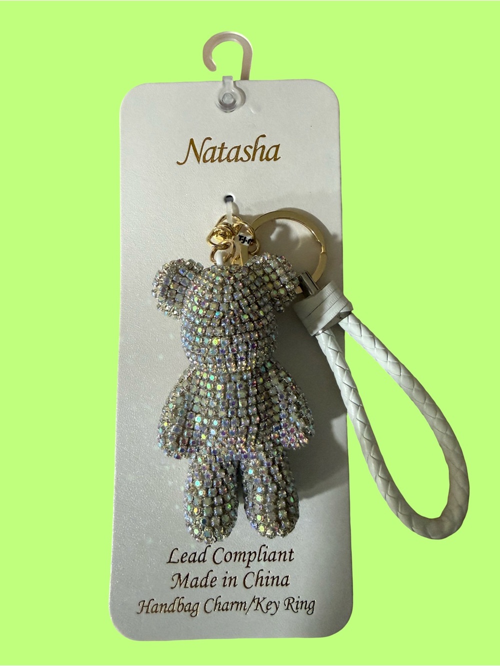 Natasha Couture Iridescent Crystal Teddy Bag Charm with White Braided Strap